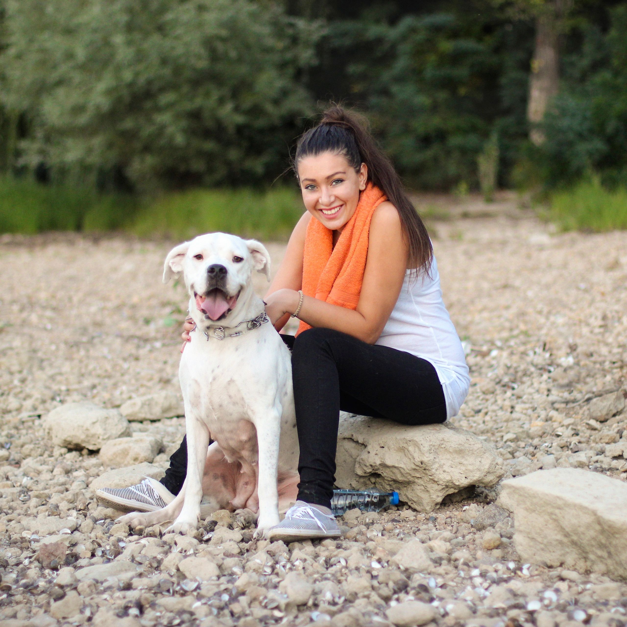 Smiling pet owner with their dog